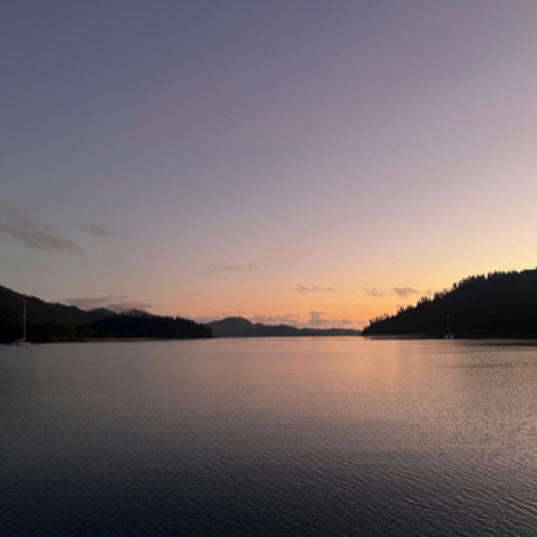 a sunset over a body of water